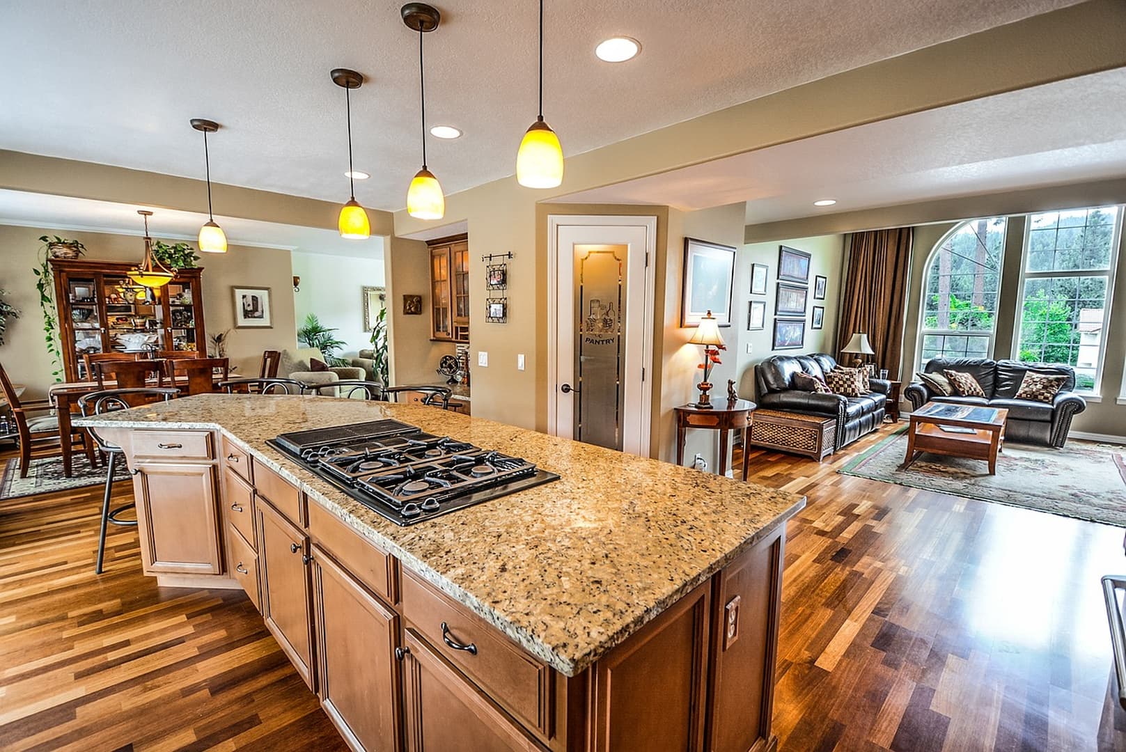 Open-plan home with granite island after an Ari's deep clean